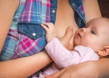 fussing at breast