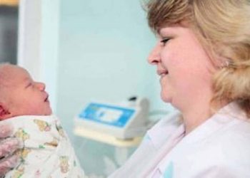 Mother In Law Sneaks A Baby Snuggle Before New Mama