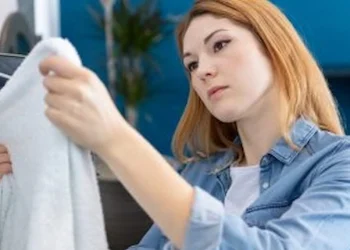 brown flakes on clothes